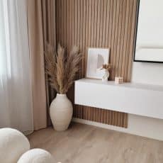 Diamond Oak slat wall with white recosilent acoustic felt in livingroom